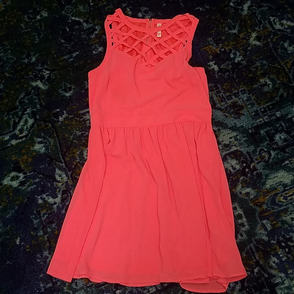 Coral colored summer dress with crisp cross design